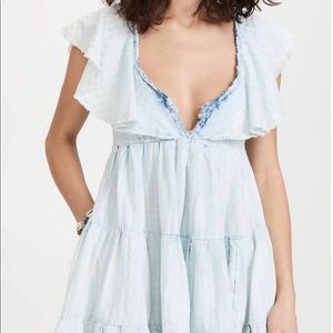 Free People denim colored open back mini dress